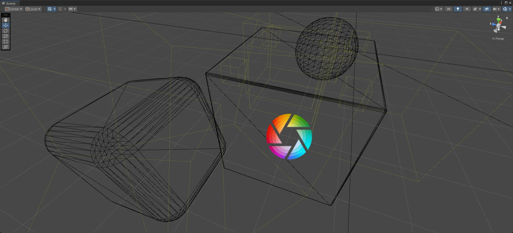 The complex scene in wireframe, with the decal volumes outlined in thin yellow lines around the capsule, box and sphere.
