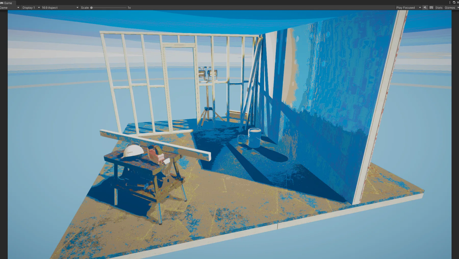 The room in pale and deep blues with tan floor patches.